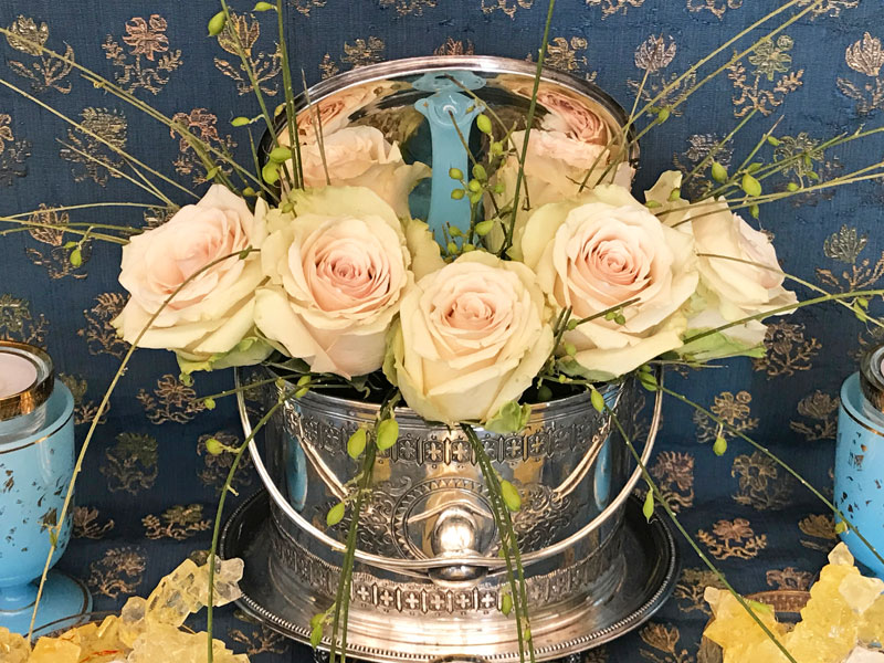 pastel Pompeii roses in an antique silver biscuit box