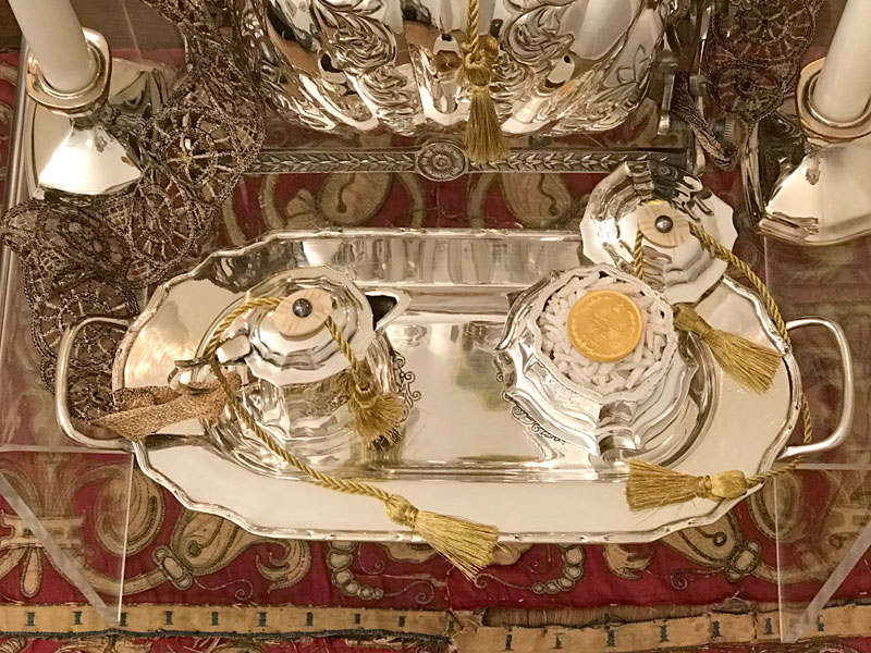 delicate tray, rosewater, sugared almonds, coin