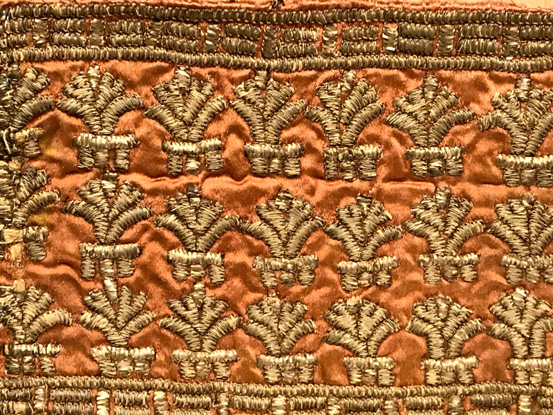 orange silk with gold and silver threads