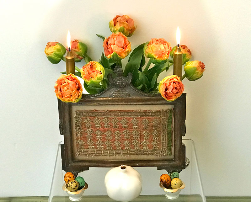 sofreh with tulips, candles, pomegranate, qual eggs