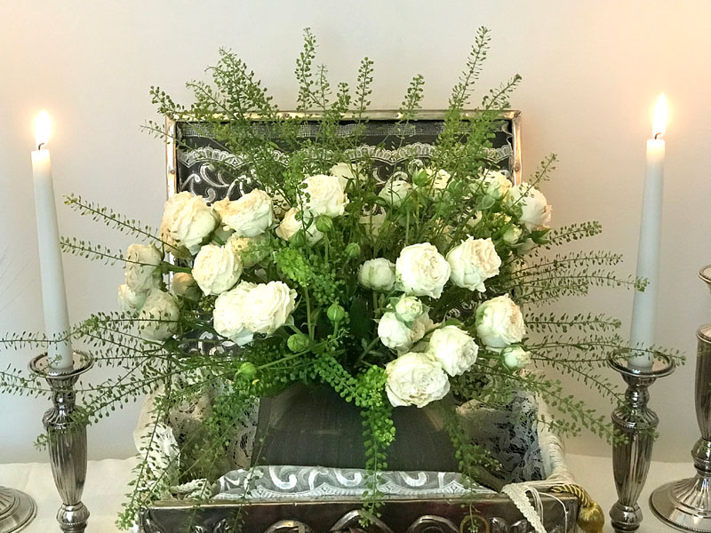Indian silver box with its open lid which is lined with lace