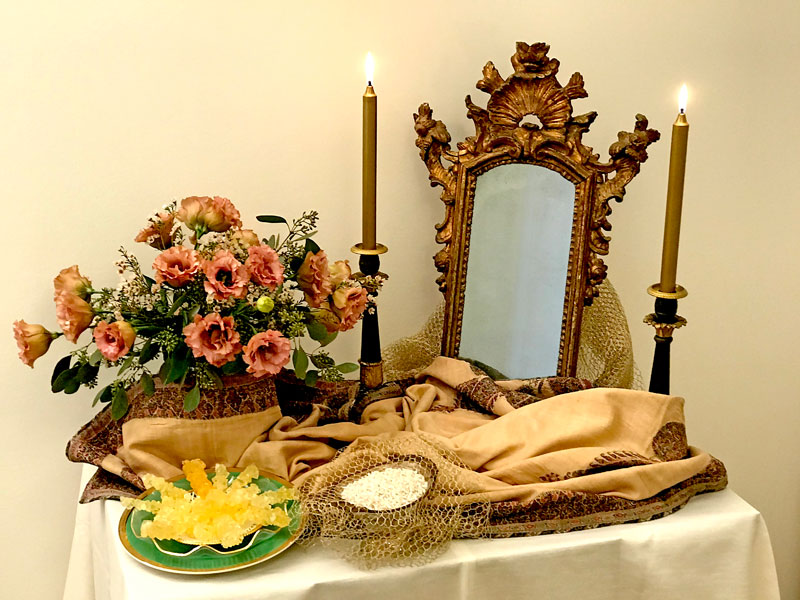 Mirror, candelabra, flowers, sugared almonds &amp; crystal sugar