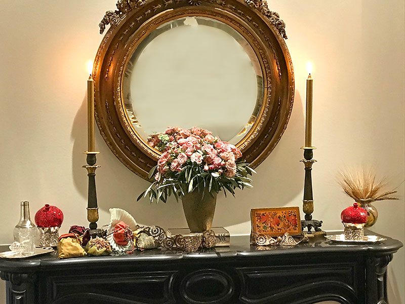 Ceramic pomegranates, sheaves of wheat, an antique Qur’an, and bonbonnières