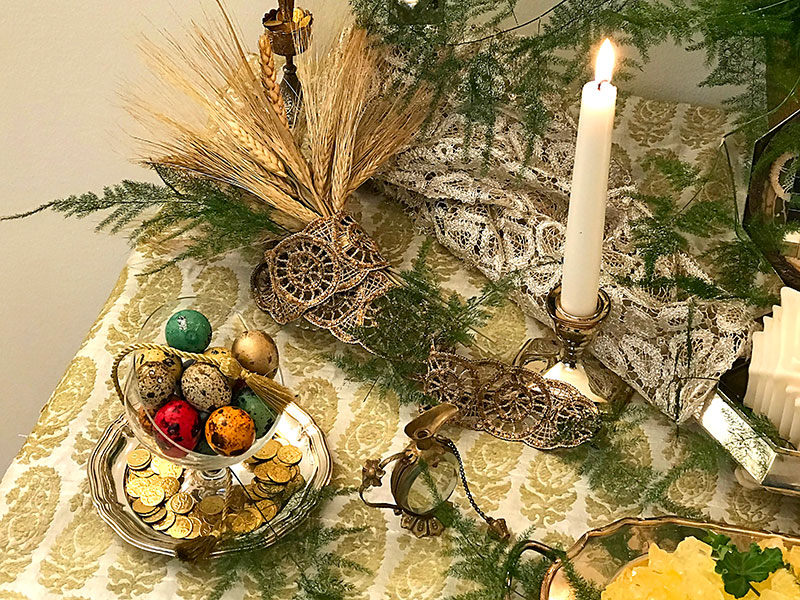 sheaves of wheat, coloured eggs, gilded coins, rosewater