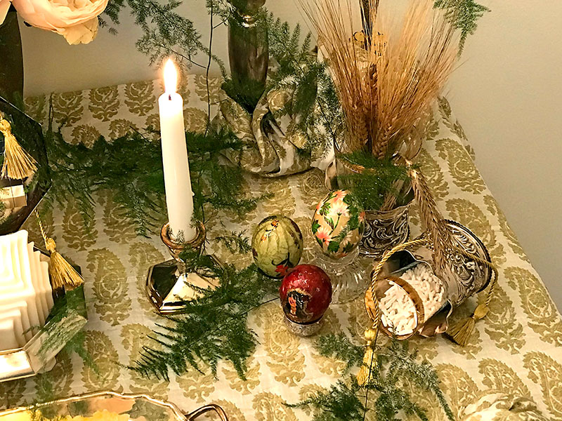 sheaves of wheat, hand-decorated eggs and sugared almonds