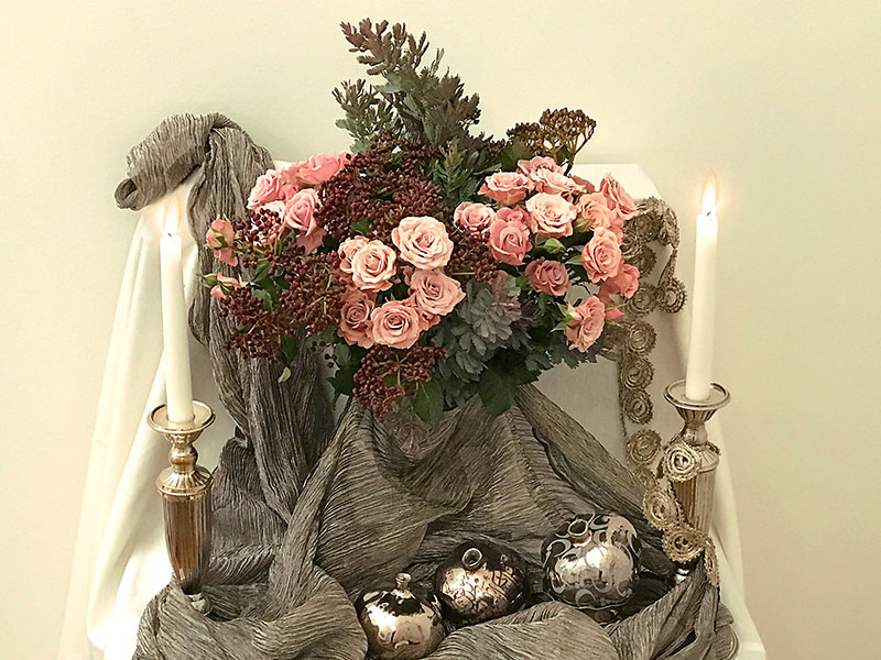 ceramic pomegranates and foliage