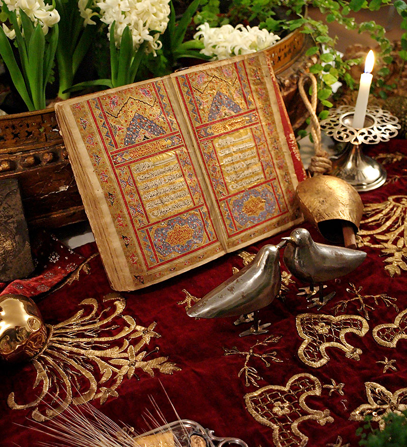 hand-written Qur’an, opened