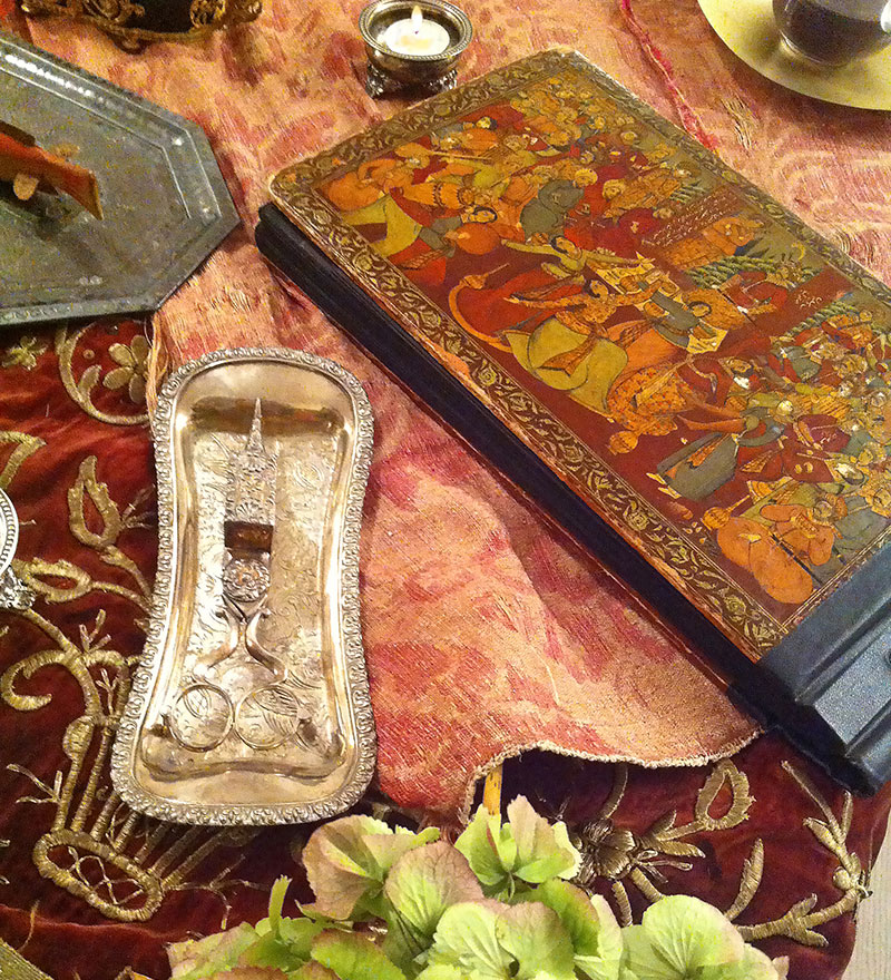 antique photo album and snuffer