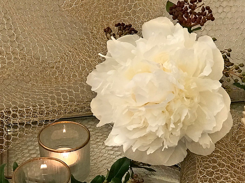 white peony and candles