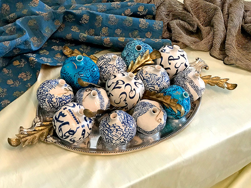 ceramic pomegranates in blue and white tones