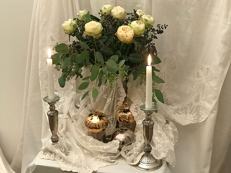 Bouquet, candles, antique lace