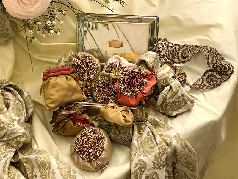 mini composition with bonbonnieres, and indian silk fabric