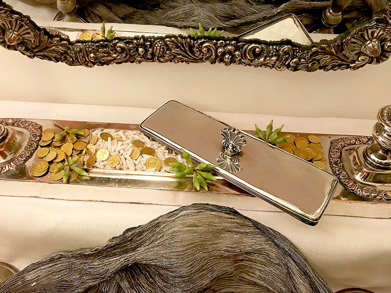 Sofreh with box of gilded coins, sugared almonds