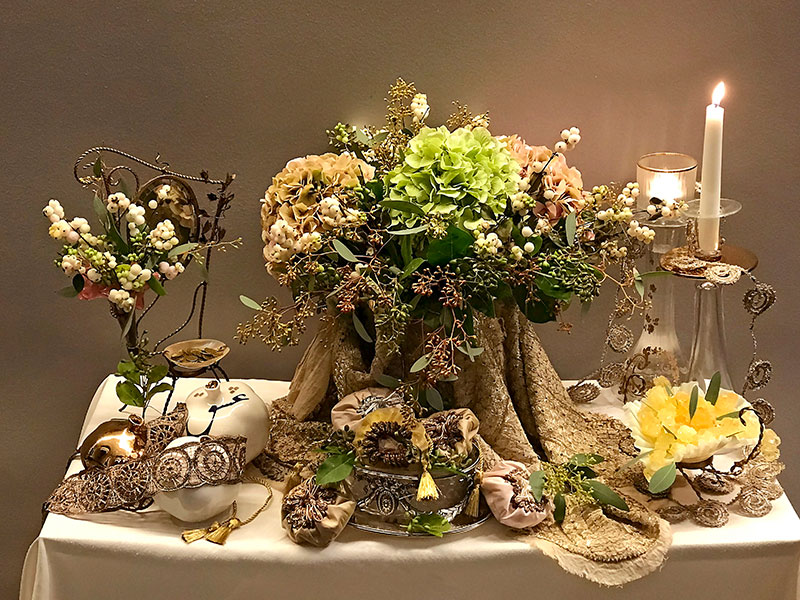 sofreh with bonbonnieres, crystal sugar, pomegranates