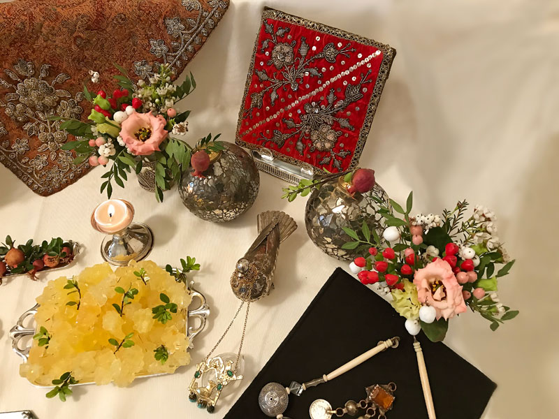 bright red velvet embroidered with metallic threads, seed-pearls and sequins