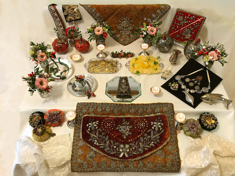 bejewelled sofreh with jewellery and intricate embroidery and jewel-like symbolic elements