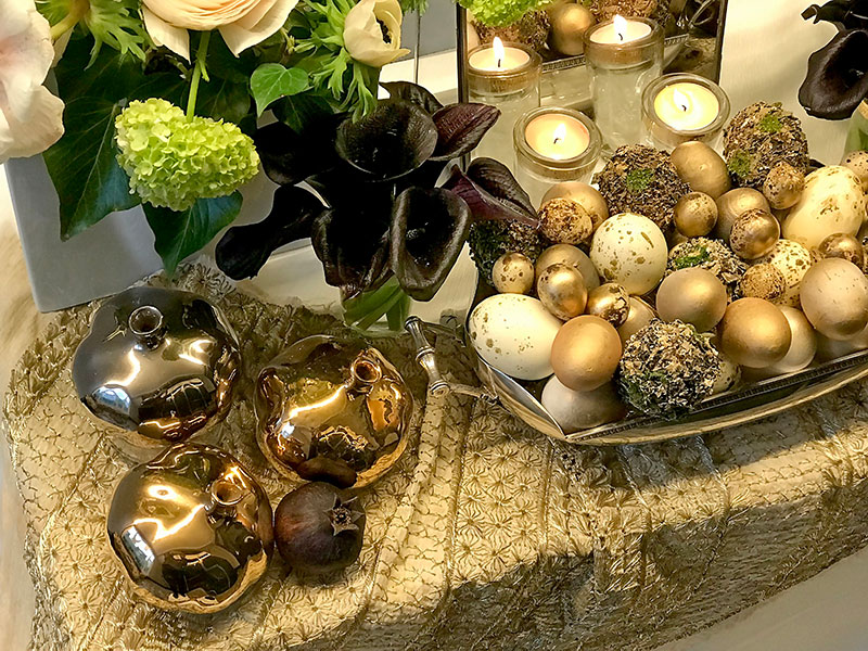 glazed ceramic pomegranates on indian textile