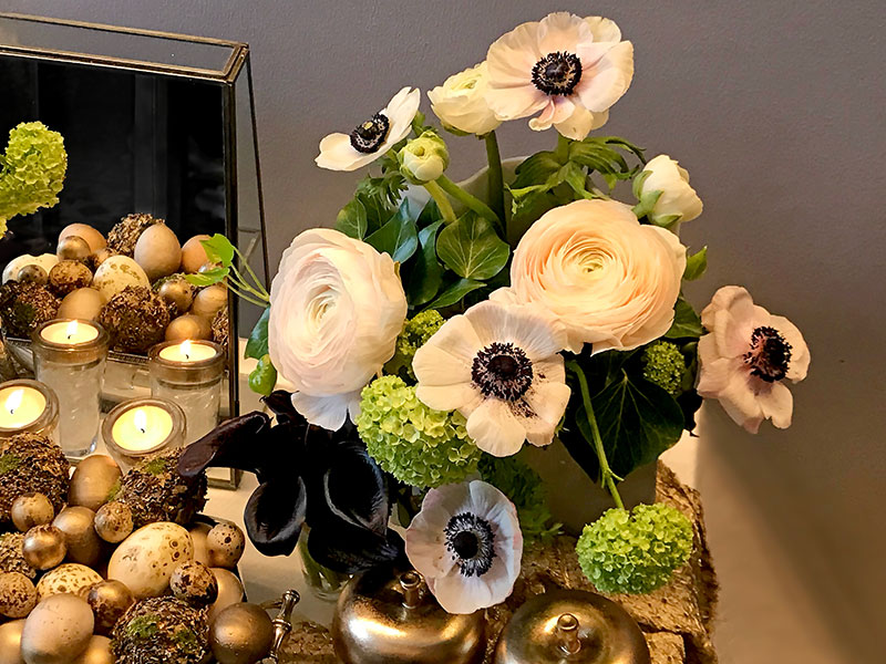 bouquets of Hanoi ranunculi, anemones and Cantor black calla lilies