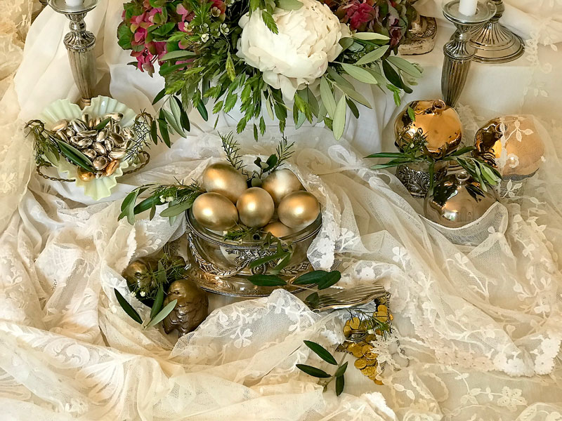 antique vessel contains silver and gold finish sugared almonds