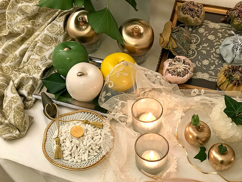 sculptured apples, sugared almonds with gold tassels and bonbonnieres