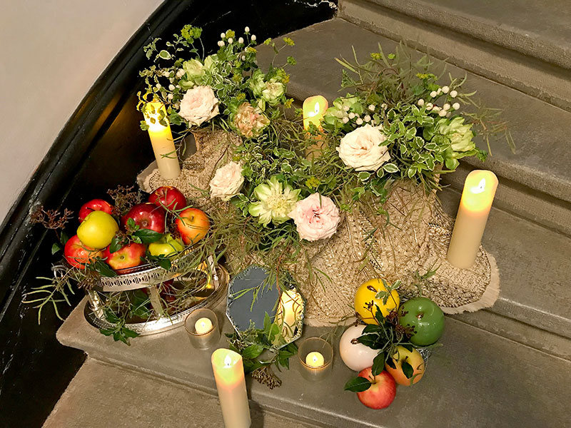 three level sofreh with flowers and apples