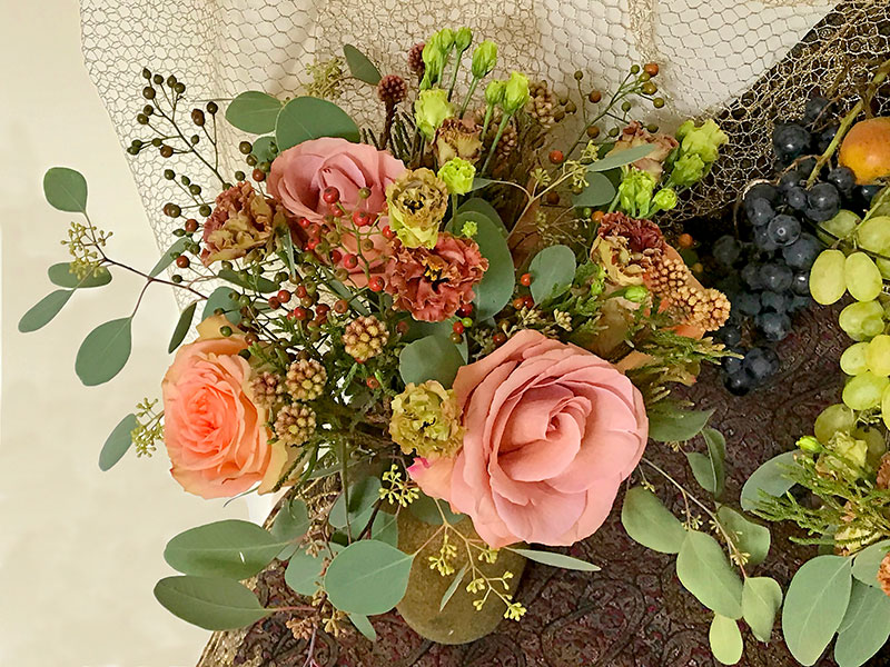Roses, Lisianthus Terracotta, Brunia fragarioides, Eucalyptus populus and rose hips