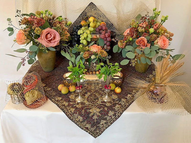 Three bouquets of flowers and foliage