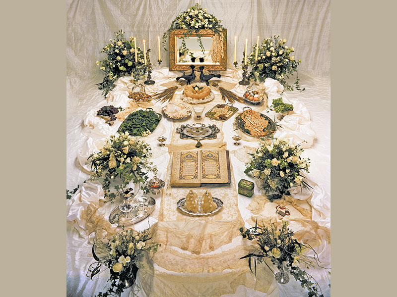 Sofreh with antique lace, multiple bouquets of white and cream