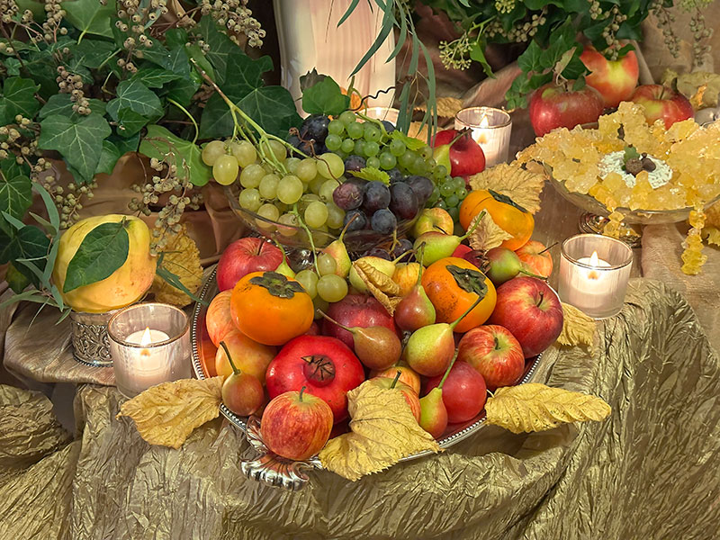 shiny apples, miniature pears, persimmons and pomegranates