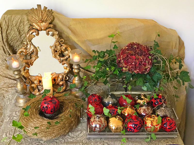 a single deep-red oversized hydrangea and trailing ivies